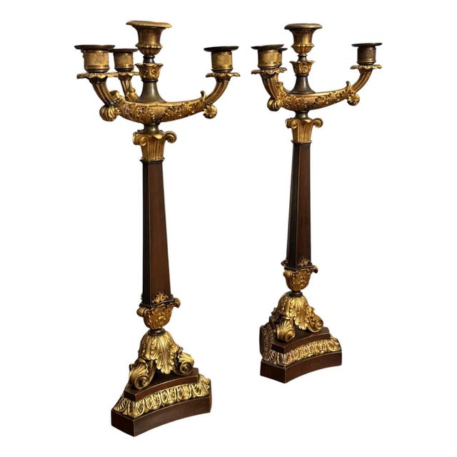 French Empire candelabras in gold and patinated bronze, France 1st half of the 19th century. Gilt bronze arms equipped...