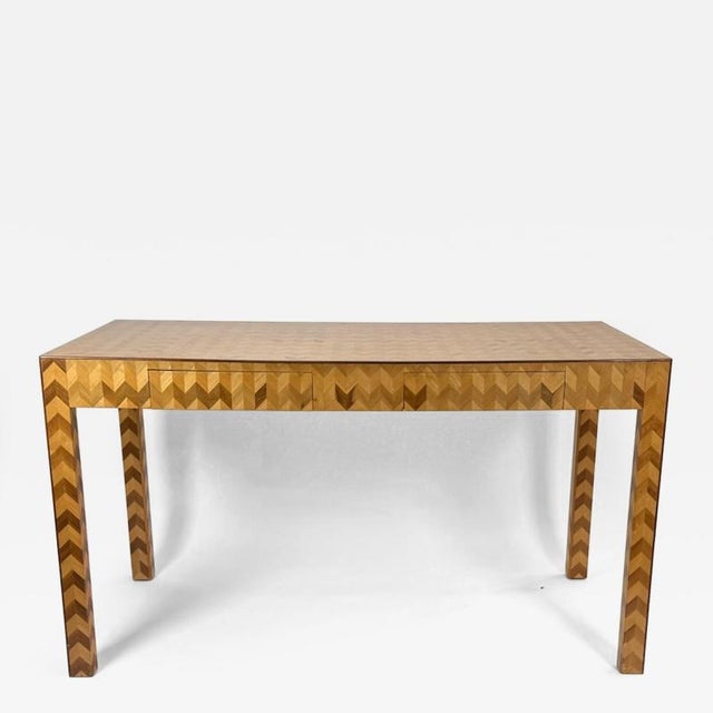 This rare mid-20th century Italian parquetry desk pairs the distinctive streamlined Parsons-style design with the flair of...