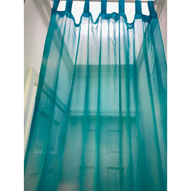 The Silk Chiffon Cloud tie dye Curtain Panel by Sethi & Sethi is a light-weight fabric made of silk with a beautiful...
