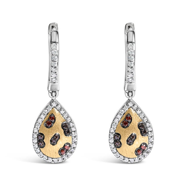 Indulge in the exquisite artistry of these enchanting earrings, meticulously crafted from 10K yellow gold-plated sterling...