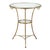 An elegant vintage round gueridon table featuring a clear glass top set within a slender gilt metal frame. The graceful...