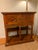 A handsome early-19th-century French document cabinet, or cartonnier, in richly figured mahogany with crisp brass...