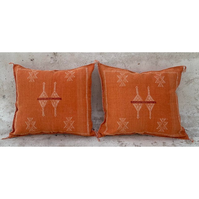 Handcrafted Orange Cactus Silk Pillow – Moroccan Elegance Meets Vibrant Design Bring warmth and character to your space...