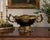 Richly appointed in deep cobalt porcelain and framed by finely cast ormolu mounts, this impressive French Sèvres style...