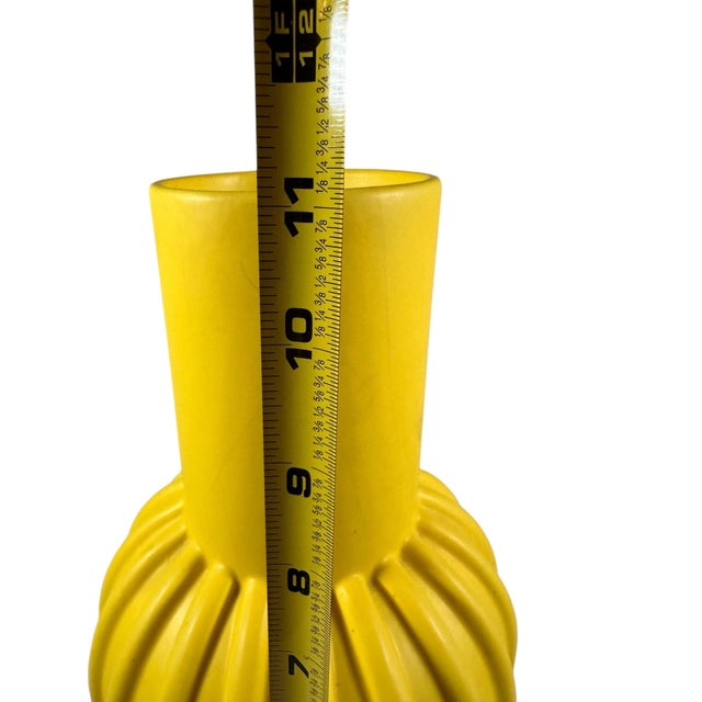 Very cool modern yellow semi Matt finished Vace from Ikea. Great accent piece.