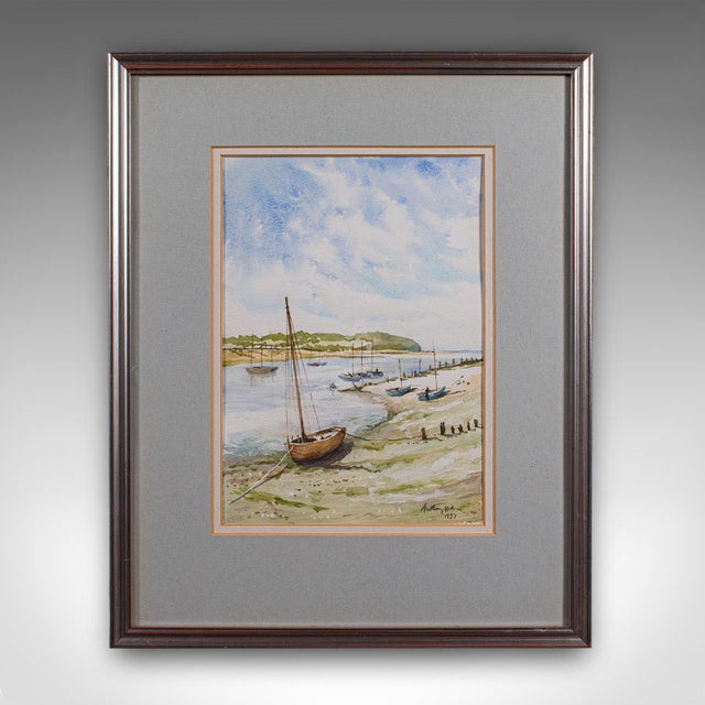 This is a vintage beach landscape painting. An English, watercolour with nautical interest, dating to the late 20th...