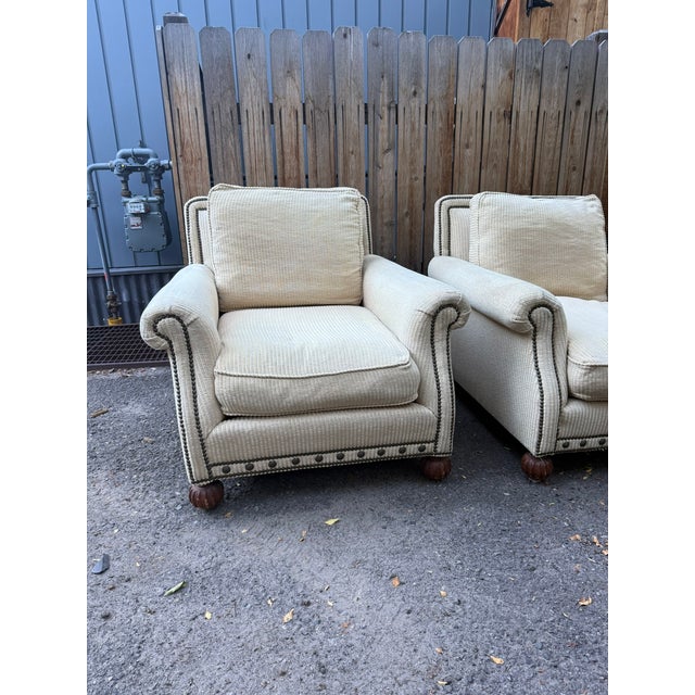 Beautiful pair of Ralph Lauren Home lounge chairs manufactured by Henredon, combining Ralph Lauren’s classic American...