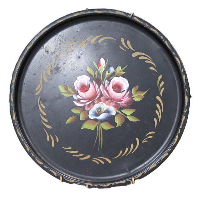 Beautiful vintage hand painted toleware platter with hanging bar. This hand painted floral toleware display plate is from...