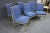 Set of six blue mid century side chairs with brass frames