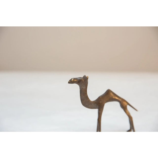 Vintage handmade African dark bronze camel. Circa mid 20th century and possibly older, this piece has such incredible...
