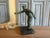 A beautiful sculpture of a man throwing a ball while playing the game of petanque, also known as jeu des boules. from the...