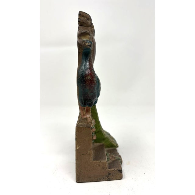 Antique Hubley Peacock Doorstop Cast Iron Doorstop with a colorfully painted peacock poised by a Victorian urn. Colorful...