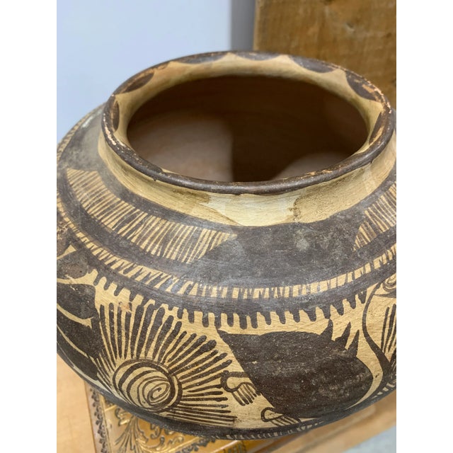 Vintage Hand Painted Clay Pottery Vessel from Mexico’s Huasteca Region. These pots are painted using a feather which gives...