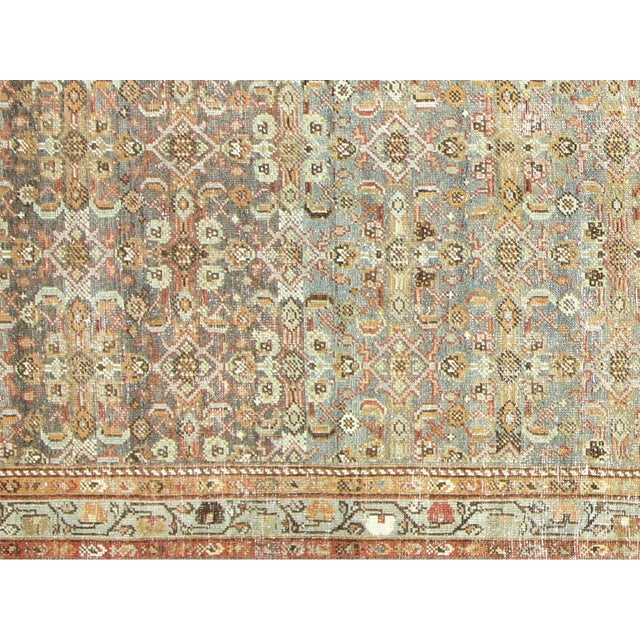 This beautifully hand-knitted Semi Antique Persian Melayer Runner is crafted with an intricate and classic design. With...