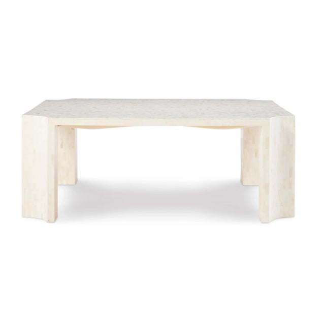 A celebration of form and material, the bowie cocktail table is crafted from inlaid bone.