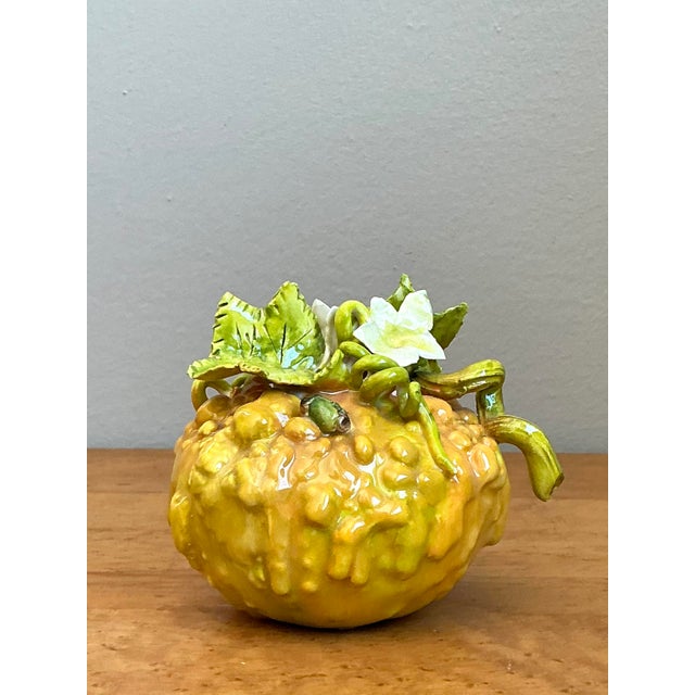 This charming vintage glazed ceramic sculpture captures the beauty of nature with its exquisitely detailed depiction of a...
