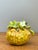 This charming vintage glazed ceramic sculpture captures the beauty of nature with its exquisitely detailed depiction of a...