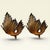 Pair of leaf-shaped wall sconces. Antique torch-style lighting fixtures, projecting light upwards onto the wall. Stunning...