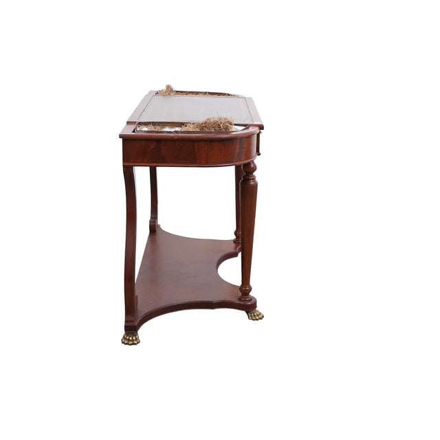 This Rare Mahogany Console Writing Desk is a stunning piece of antique furniture with a unique and charming design. The...