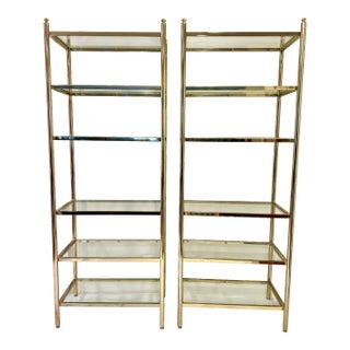 1980s Vintage Pair of Regency Style Brass Finish and Glass Six Shelf Etageres For Sale
