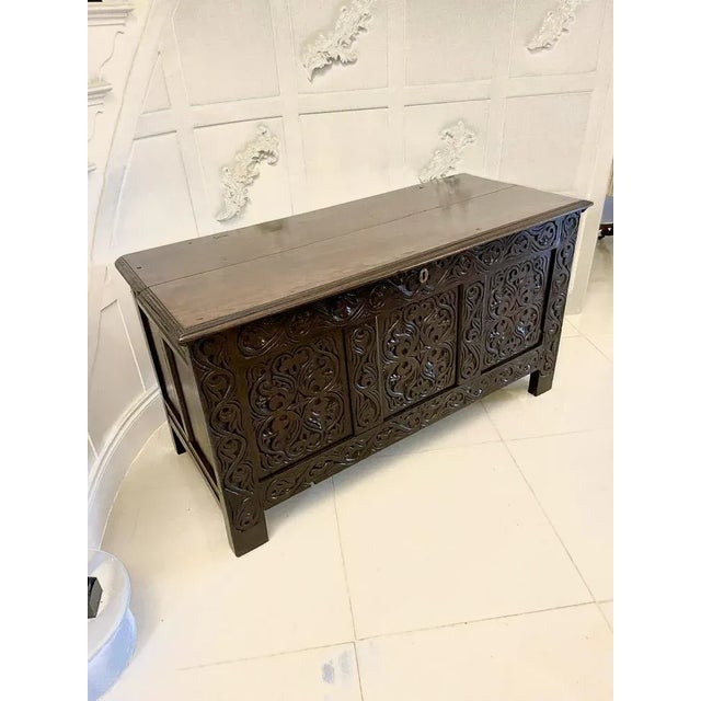 Antique early 18th century carved oak coffer/chest having finely carved detail to the panels and frieze, panelled sides,...
