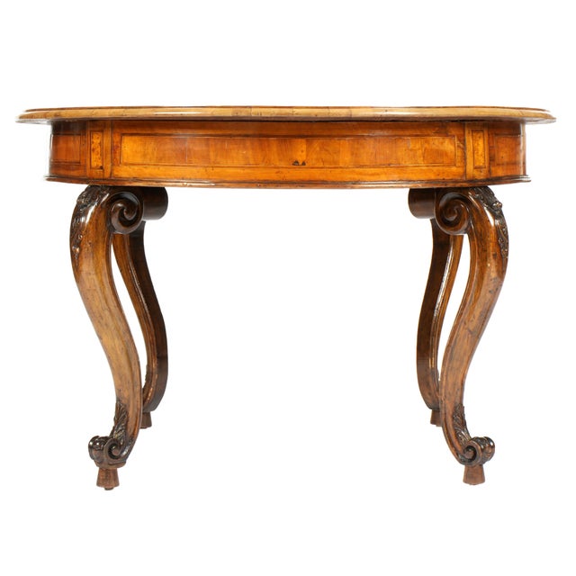 Italian Inlaid Round Center Table. Table features a round, banded top expertly executed in marquetry and parquetry....