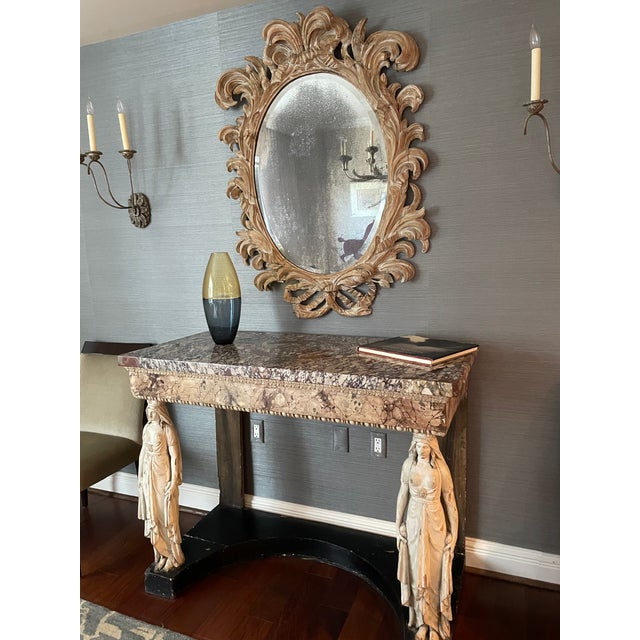 Italian console in the Directoire style with faux marble facia matching original marble top, circa 1800. Caryatids, draped...