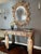 Italian console in the Directoire style with faux marble facia matching original marble top, circa 1800. Caryatids, draped...