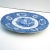 Classic Staffordshire transferware plate by Ridgways in the “Oriental” motif. Features delicate blue and white decoration...