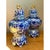 This pair of vintage lidded jars takes the classic silhouette of a Chinese ginger jar, with a rounded, bulbous body rising...