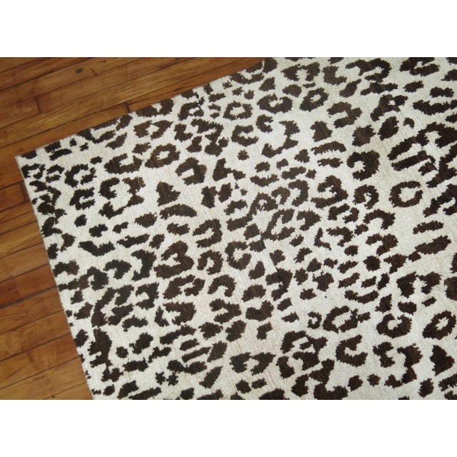 Exquisite one-of-a-kind handwoven Turkish superfine wool on silk rug with all-over leopard motif in clear white and dark...