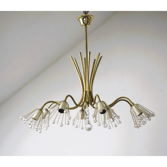 Well-preserved lamp by Rupert Nikoll. 8 sockets E14 I have official proof of authenticity such as vintage catalogs,...