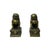 This pair of ornate Chinese Guardian Lion statues, commonly known as Foo Dogs, is cast in a heavy, dark-patinated bronze...