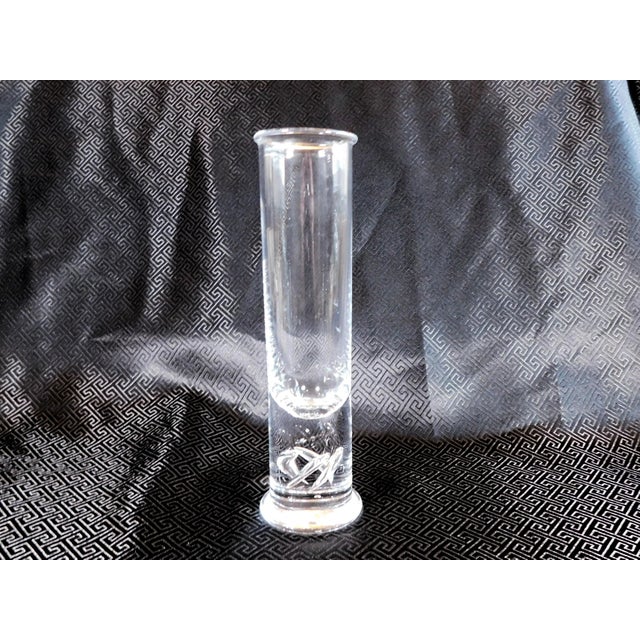 This is a set of ten tall Pilsner glasses with a glass swirl in the base. They are by Holmegaard in the High Life Pattern...
