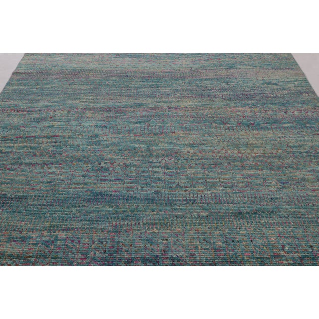 This magnificent 8 x 8 Abstract rug from rug & Kilim’s Modern Collection is a kinetic, textural work of art, hand-knotted...