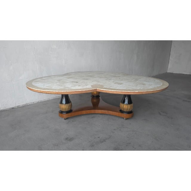 Rare vintage coffee table designed by Maurice Bailey for Monteverdi-Young, featuring a distinctive clover-shaped bi-color...