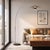 The Float Arc Lamp is a modern arc lamp with a Satin Nickel steel body and a Black Marble base, designed to be a statement...