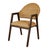 The Walter round back armed dining chair features a woven rattan seat and backrest. The curved arms and rounded back...