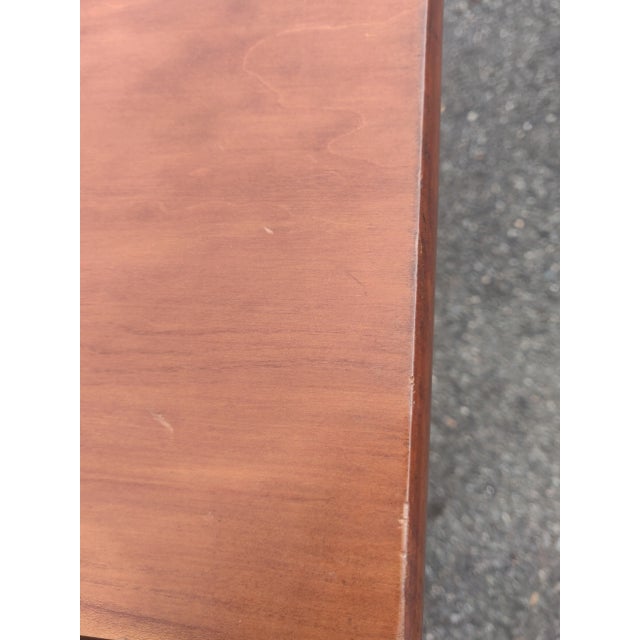 Classic and simple cherry drop leaf side table having two drawers and turned legs. When open 41 W closed 21W