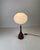 Beautiful and elegant table lamp made of a mahogany tulip foot and a satin blown murano glass diffuser. Named sphera t,...