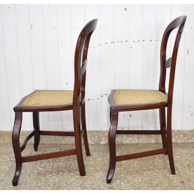 : Mahogany wood chairs with backrests in the shape of a lyre or “inverted ball”, typical of the Louis Philippe period...