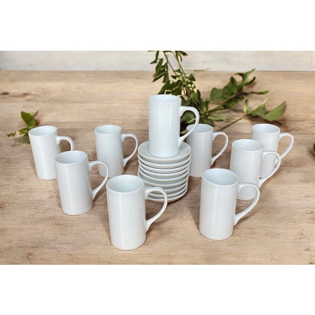 Vintage Schmid Fine White Porcelain Coffee Set It comprises 9 delicate cups (or half cups for espresso) and 9 saucers....