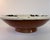 Use these bowls your tabletop with this striking terra cotta bowl, artfully finished with partial glazing and expressive...