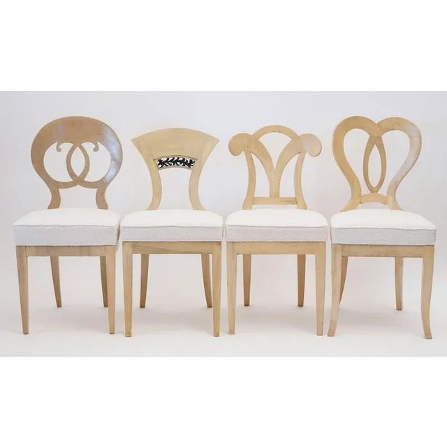The Eclectica collection showcases a selection of Biedermeier-style chairs presented in a distinctive format. Here, the...