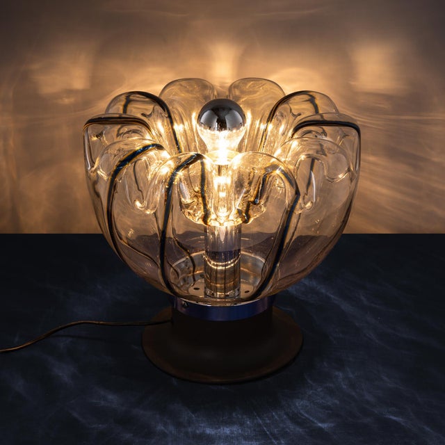 On offer is an exceptionally beautiful table lamp made of hand-blown murano glass with blue and yellow stripes by targetti...