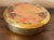 Vintage midcentury hand-enameled brass lidded trinket box. The round lid is painted in pinks with tulip blooms. Most items...