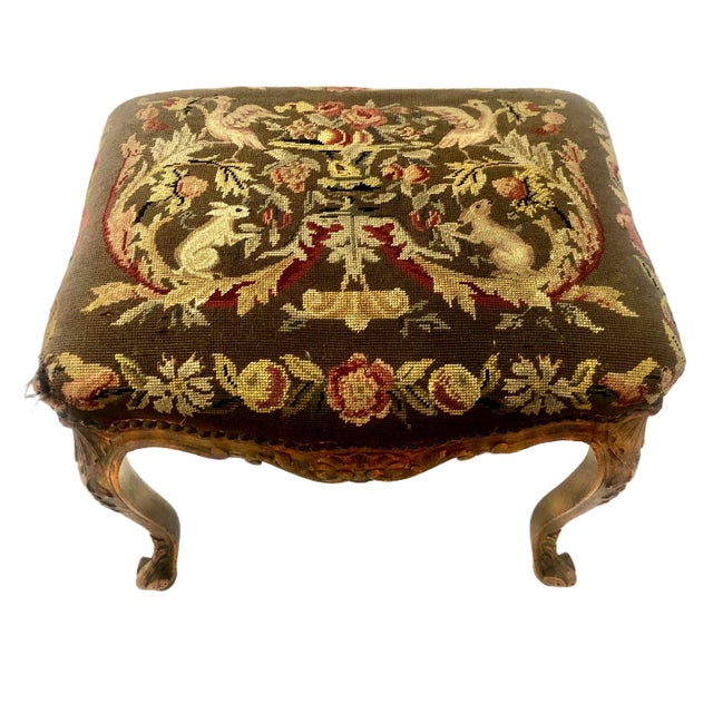 On offer is a Louis XV-style carved walnut upholstered bench. Often classified as a large footstool or window stool, this...