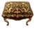 On offer is a Louis XV-style carved walnut upholstered bench. Often classified as a large footstool or window stool, this...