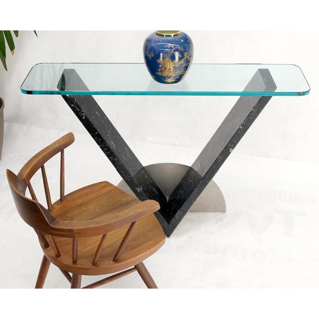 Sharp looking modern design studio made V shape black Italian marble and chrome base with 3/4" rounded corners glass top...
