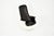High-back armchair in black leather with a molded fiberglass shell. The chair can be reclined. Wear consistent with age...